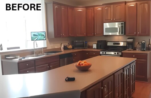 Kitchen with wooden cabinets and stainless appliances.